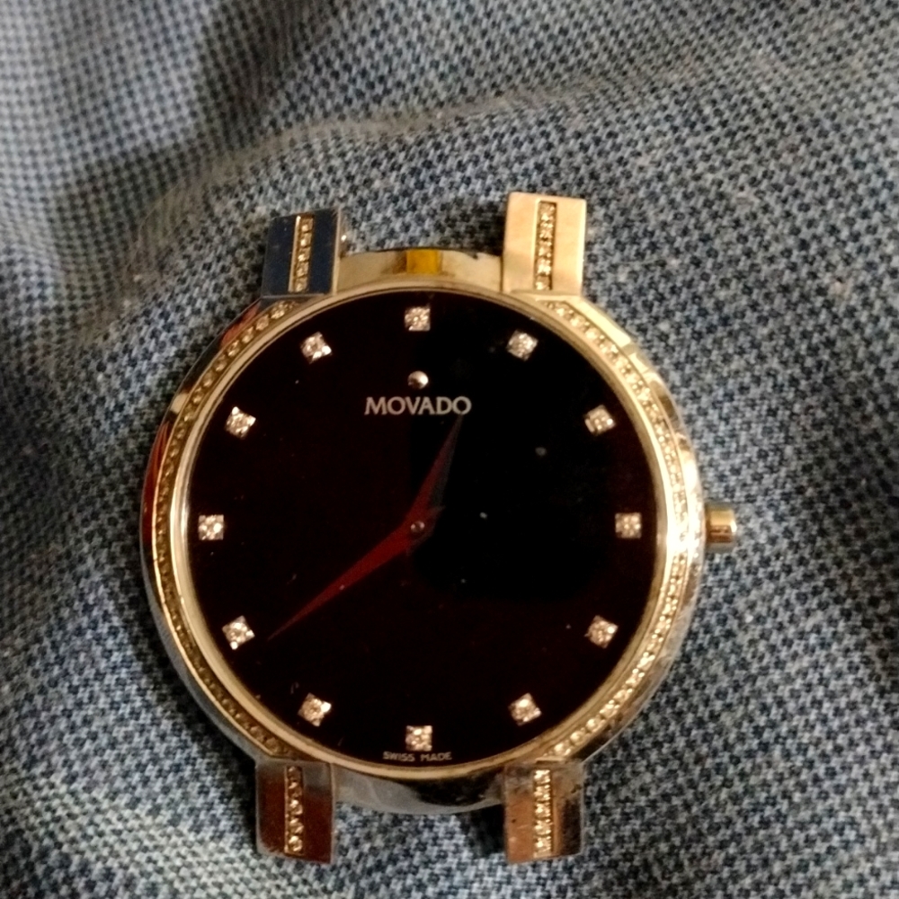 Movado watch in crusted with diamonds